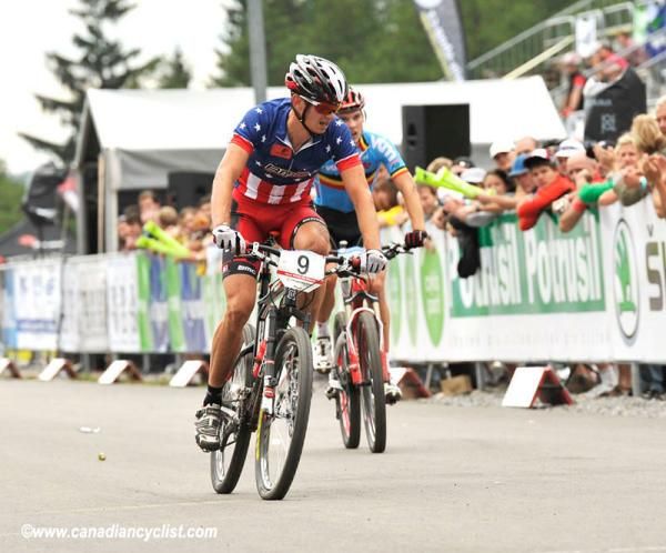 With a low tire, Stephen Ettinger just holds off Ruben Scheire for fifth
