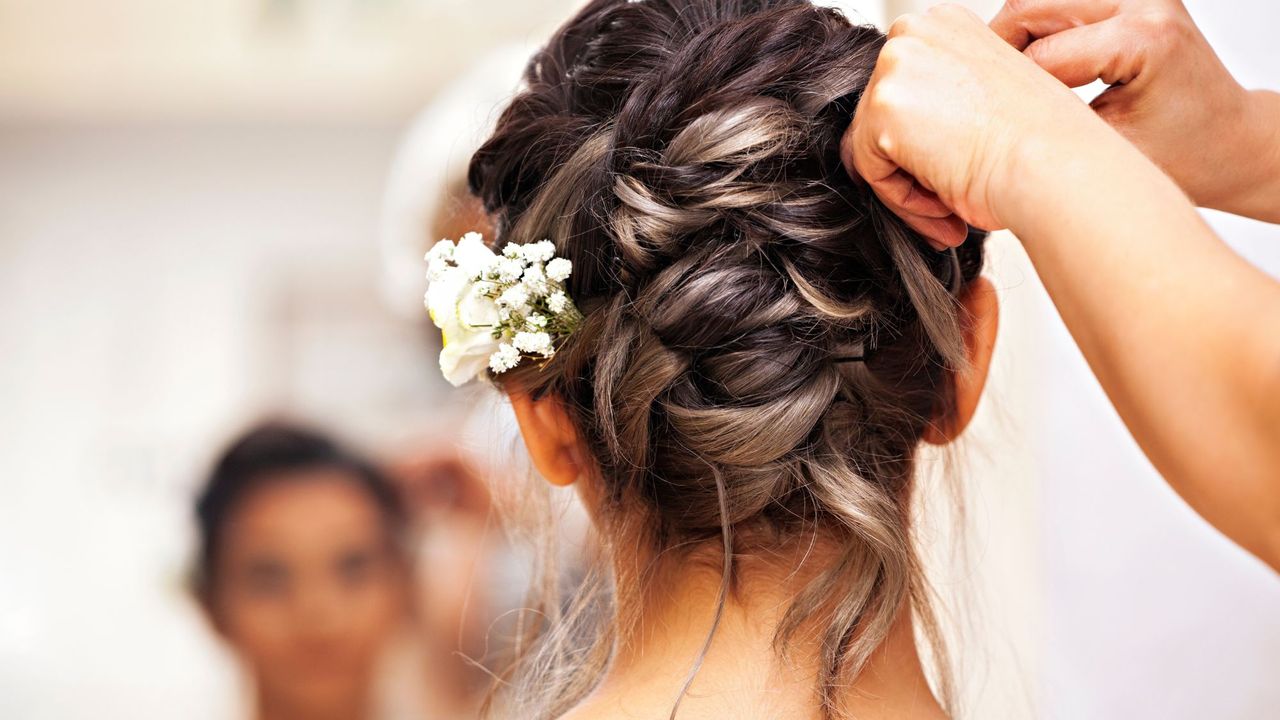 a woman on her wedding day - wedding hair trends