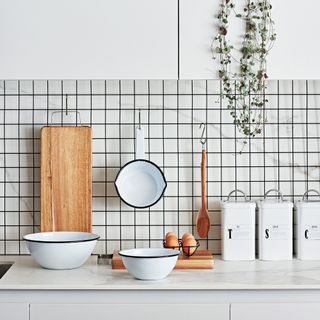 White grid tiled kitchen splashback