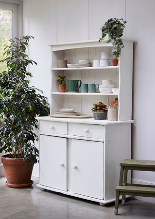 white upcycled dresser in kitchen