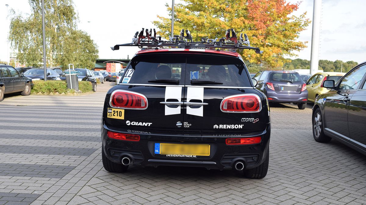 The car's design has a distinctive split rear door access