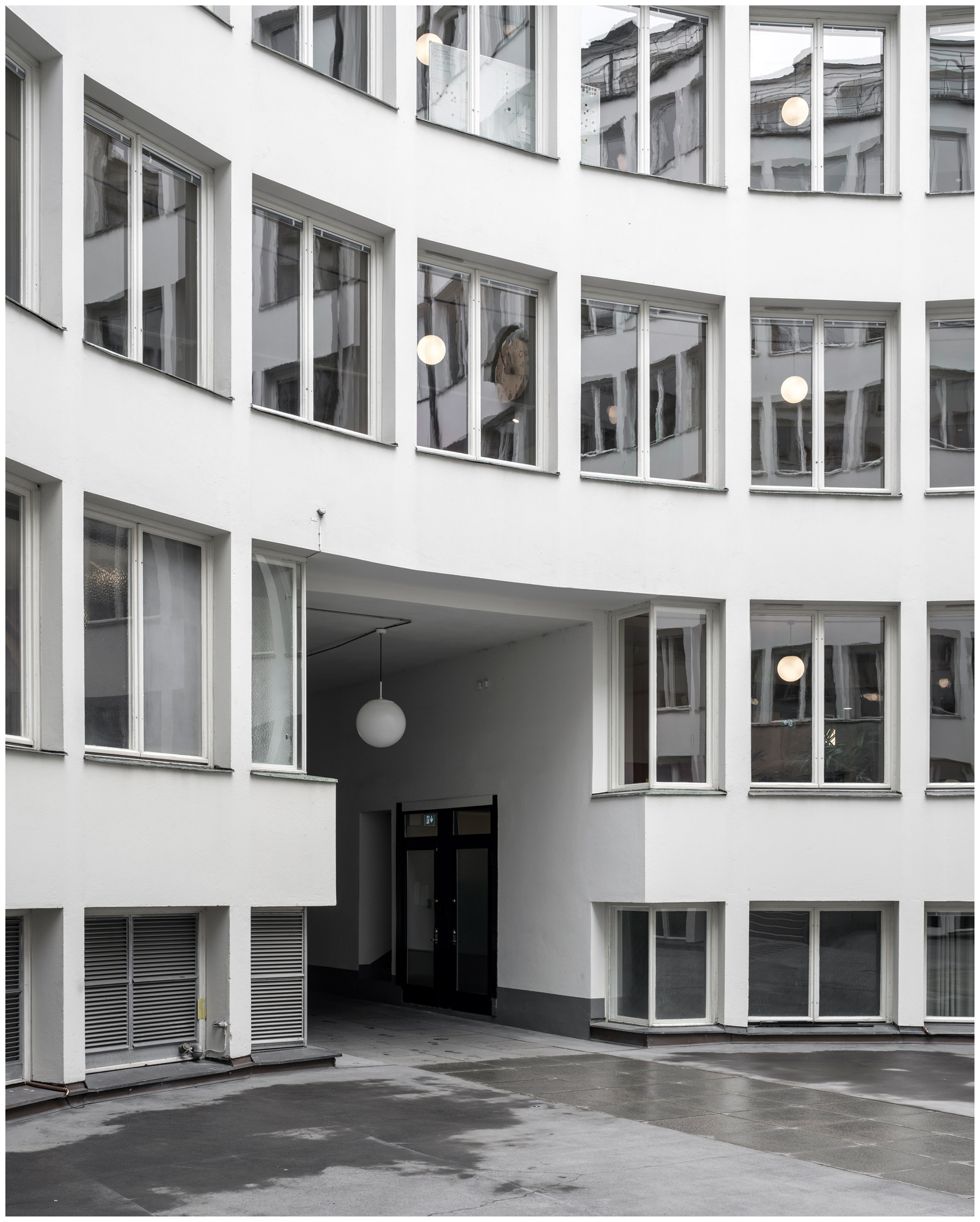Curved white building