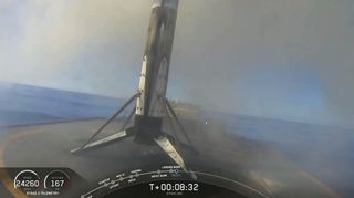 This view from a camera on SpaceX's drone ship Just Read The Instructions shows the Falcon 9 first stage on the deck after a successful landing in the Atlantic Ocean. The camera was apparently knocked off kilter during landing, but the booster was fine.