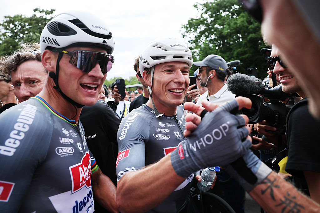 LILLE, FRANCE - JULY 05: (L-R) Mathieu van der Poel of Netherlands and stage winner Jasper Philipsen of Belgium and Team Alpecin - Deceuninck react after the 112th Tour de France 2025, Stage 1 a 184.9km stage from Lille to Lille / #UCIWT / on July 05, 2025 in Lille, France. (Photo by Christophe Petit Tesson - Pool/Getty Images)