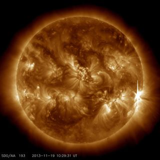 An X1-class flare erupts from the right side of the sun in this image captured by NASA's Solar Dynamics Observatory on Nov. 19, 2013. 
