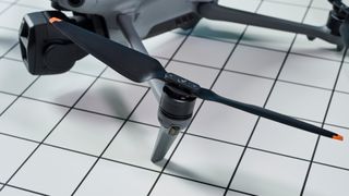 A dark gray DJI Air 3S drone