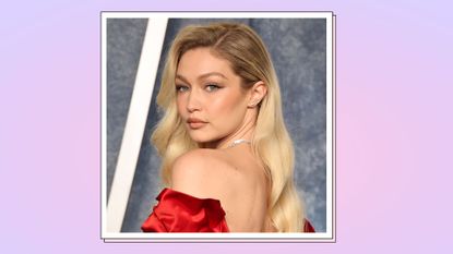 Gigi Hadid wears a shoulderless red, satin dress as she attends the 2023 Vanity Fair Oscar Party Hosted By Radhika Jones at Wallis Annenberg Center for the Performing Arts on March 12, 2023 in Beverly Hills, California/ in a purple and pink template
