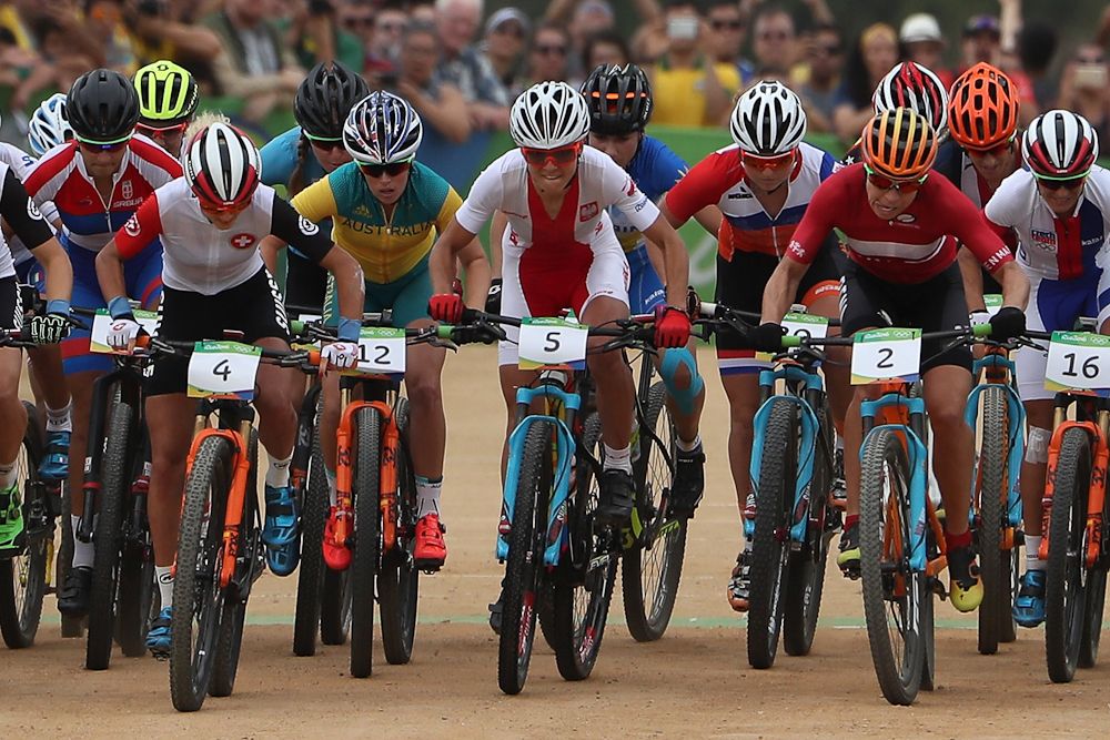 The women's field gets underway for the cross country race.