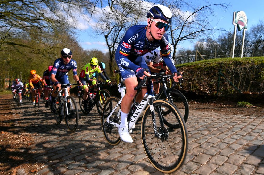 KOKSIJDE BELGIUM MARCH 19 Tim Merlier of Belgium and Team AlpecinFenix during the 19th Bredene Koksijde Classic 2021 a 199km race from Bredene to Koksijde Cobblestones Kemmelberg BredeneKoksijde on March 19 2021 in Koksijde Belgium Photo by Luc ClaessenGetty Images