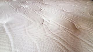 Allswell Mattress review: closeup of the creases on top of the mattress