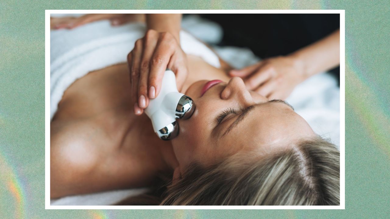 Woman having microcurrent facial 