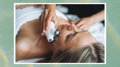 Woman having microcurrent facial 