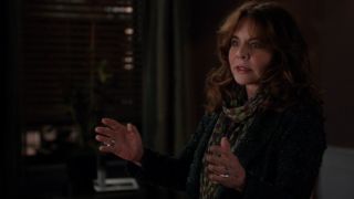 Stockard Channing talking and holding both her hands out on The Good Wife.