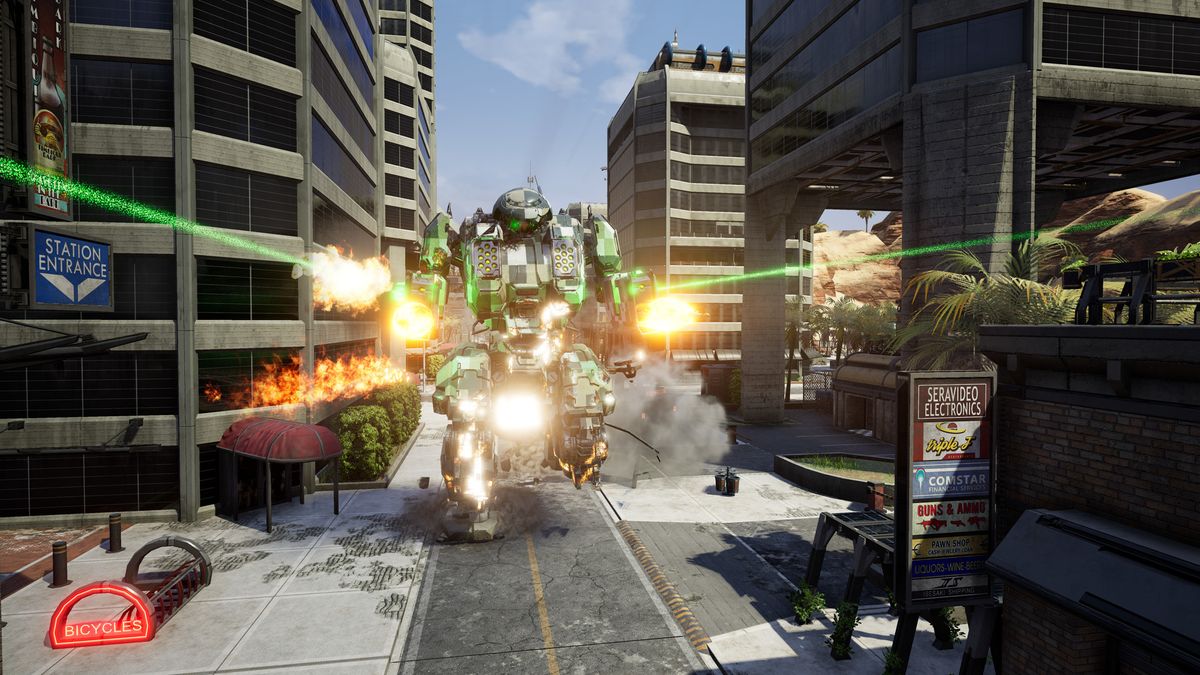 A mech blasts its way through a city street