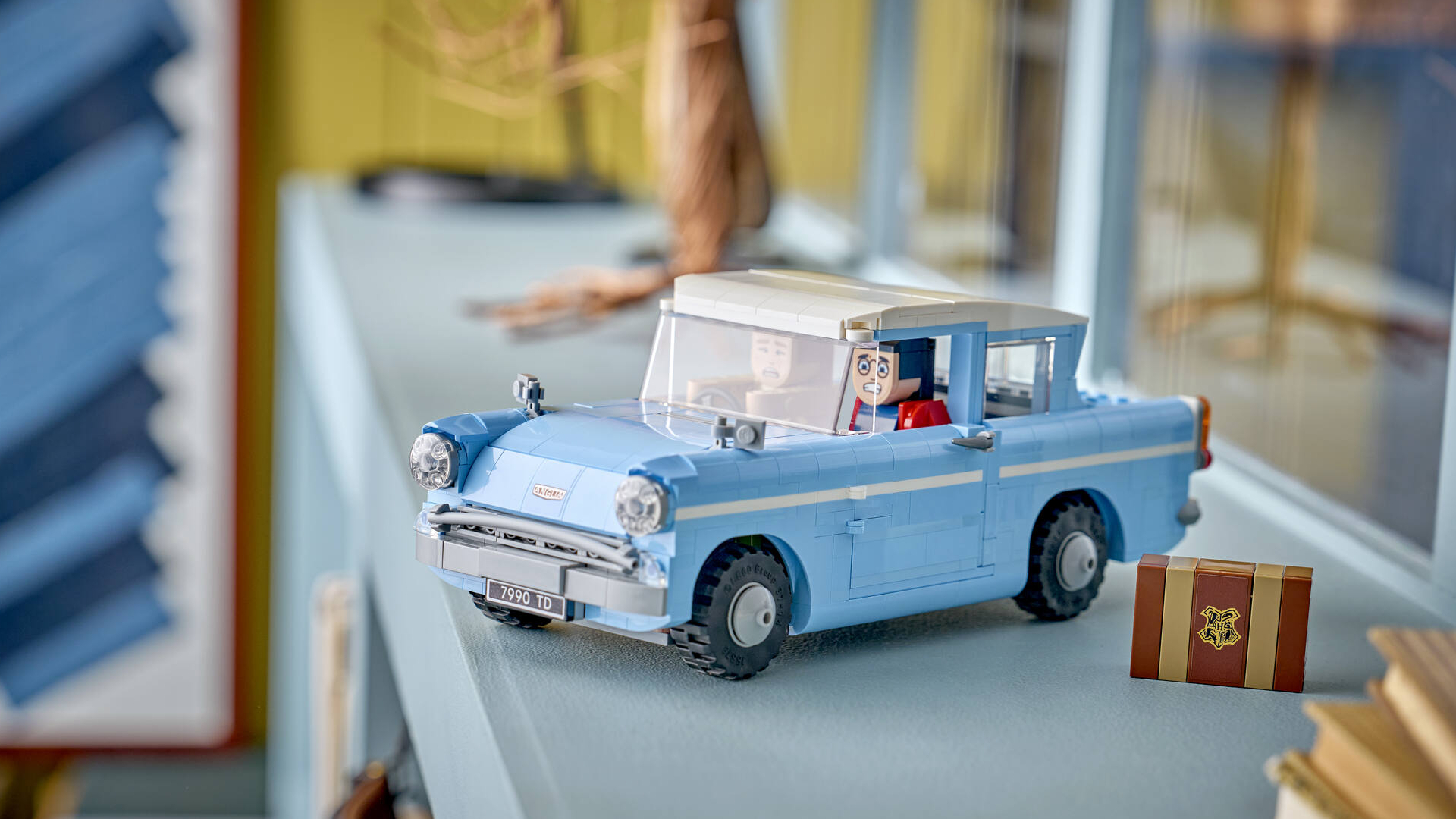 A Lego car, laid out on a side table