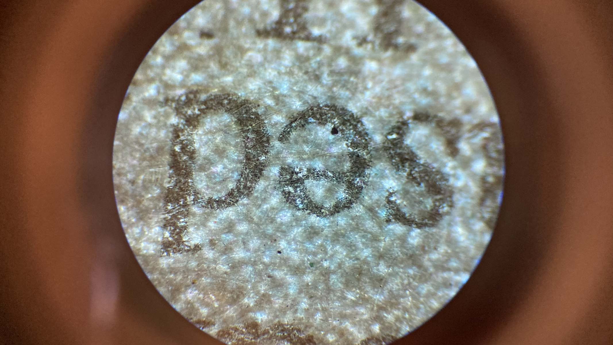 newspaper under a microscope