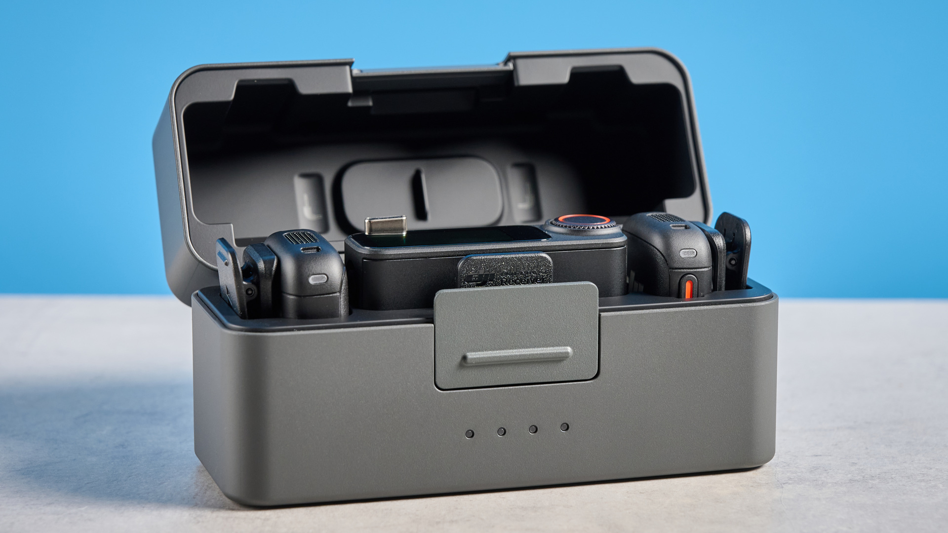 The DJI Mic 3 2TX + RX + Charging case, with all components in the case