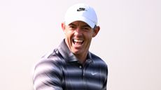 Rory McIlroy smiles during his first round at the 2026 Dubai Invitational at Dubai Creek Golf Club on the DP World Tour
