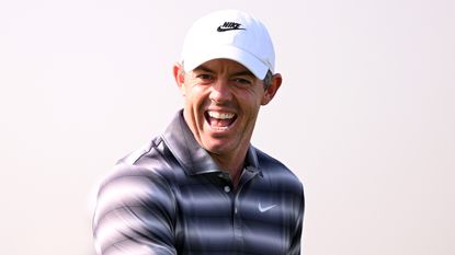 Rory McIlroy smiles during his first round at the 2026 Dubai Invitational at Dubai Creek Golf Club on the DP World Tour