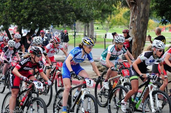 Elite Women hitting the first turn on the pavement
