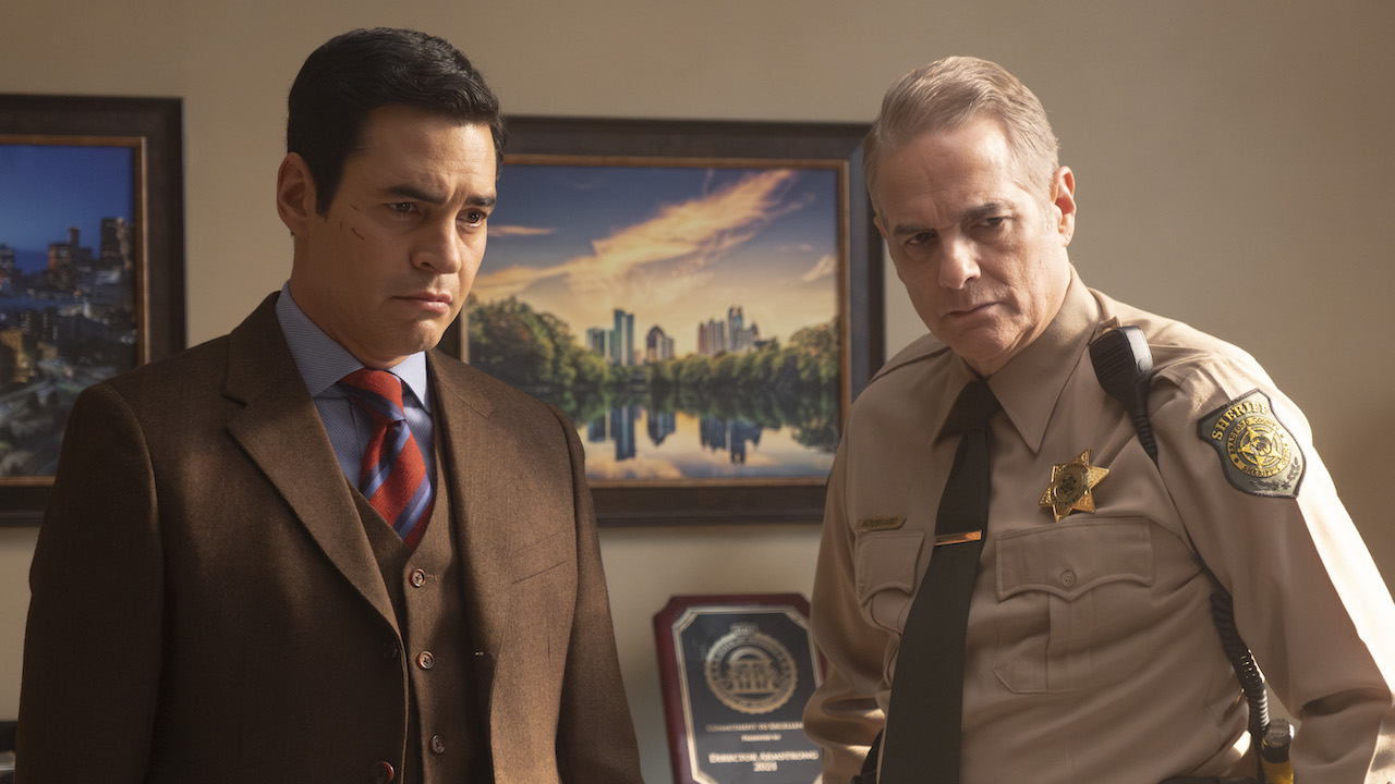 Will and Sheriff Caleb standing in an office in Will Trent Season 3
