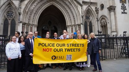 Lucy Connolly's husband, Ray, along with her legal team and supporters from the Free Speech Union pose for a photograph outside the Royal Court of Justice during her appeal hearing