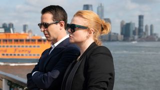 (L to R) Jeremy Strong as Kendall Roy, Sarah Snook as Shiv Roy on a boat, dressed in black in Succession season 4 episode 3