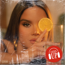 maren morris' dreamsicle album art of her hiding her face behind a glass of lemonade and made to look like it's wrapped in vinyl packing plastic
