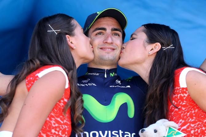 Juan Jose Lobato (Movistar) receives kisses on the podium
