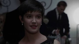 A close up of Phoebe Cates with short hair in Bright Lights, Big City