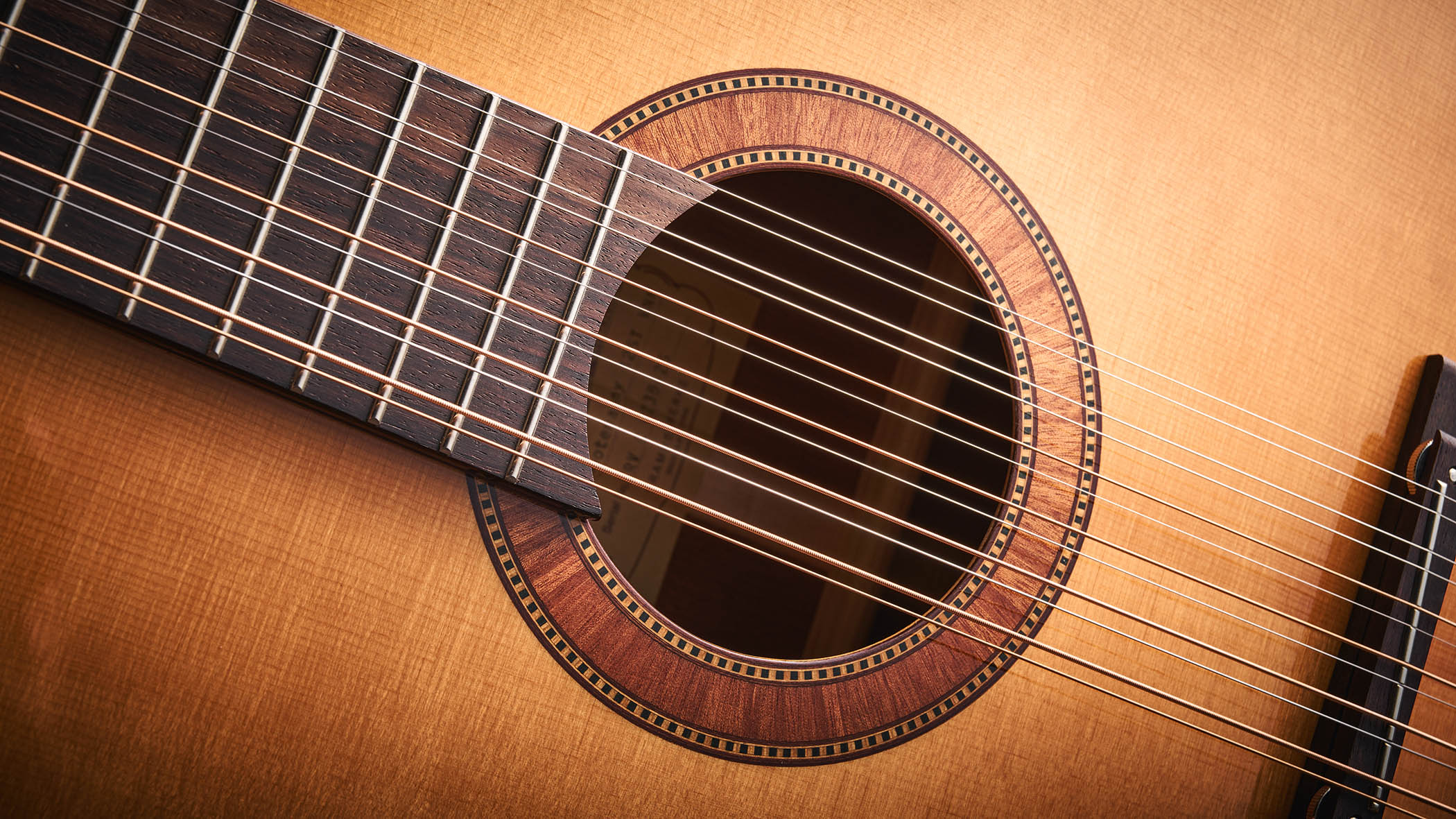 Framus&#039;s replica of original 12-string that John Lennon used on the Beatles&#039; Help! and Rubber Soul, photographed in close-up against a distressed wooden floor.