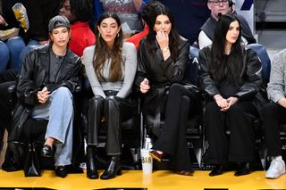 Hailey Bieber Kendall Jenner jeans cardigan coat pumps kitten heels Los Angeles Lakers game