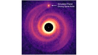 Image of a giant planet driving spiral arms in a protoplanetary disk from theoretical