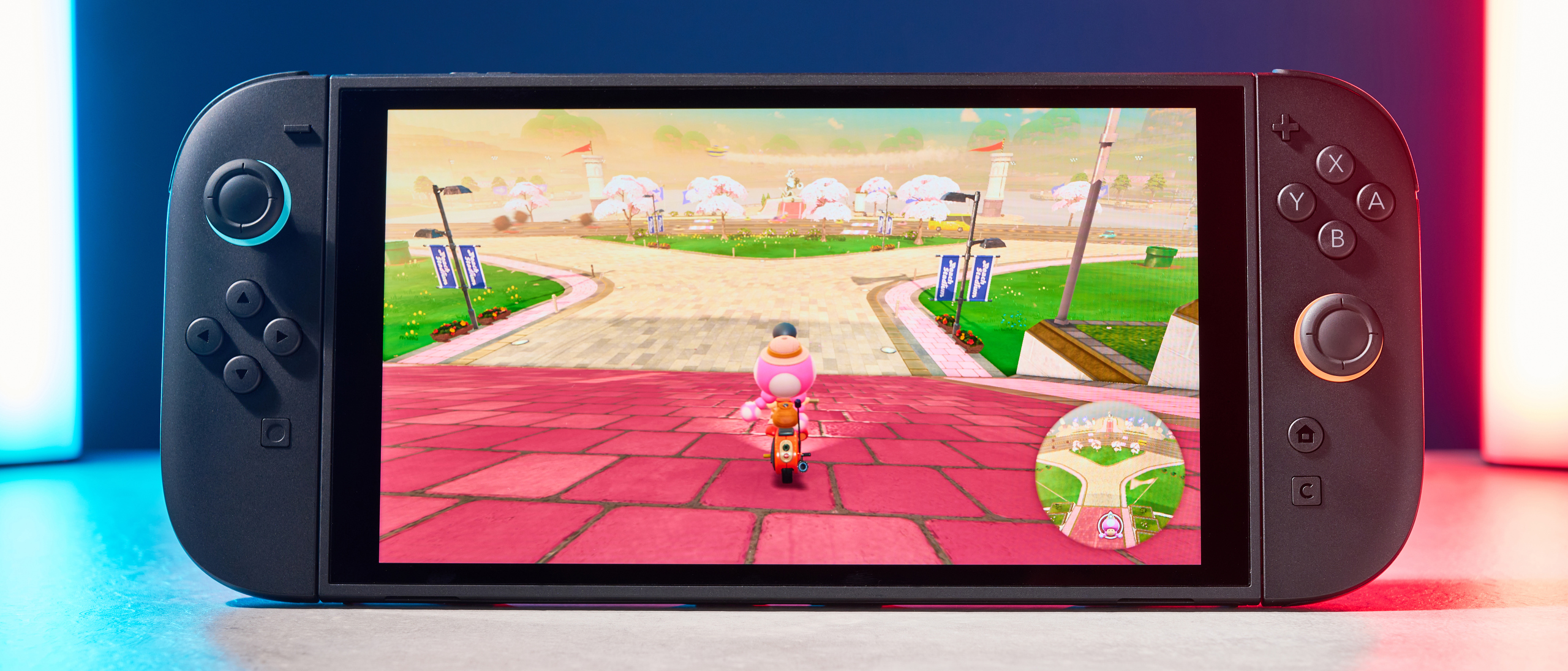 A Nintendo Switch 2 photographed under RGB lighting