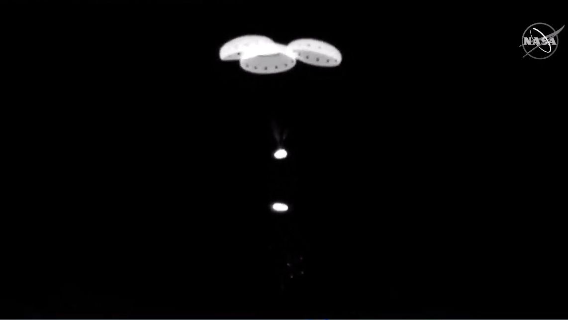 Starliner jettisons its heat shield after deploying its three main parachutes. The spacecraft then inflated six landing airbags.