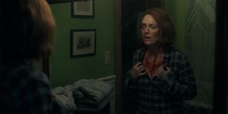 Julianne Moore as Lisey examines cuts in mirror in Lisey's Story