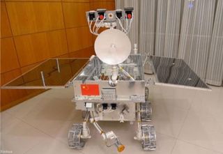A scale model of the Yutu rover shows its more anthropomorphic attributes.