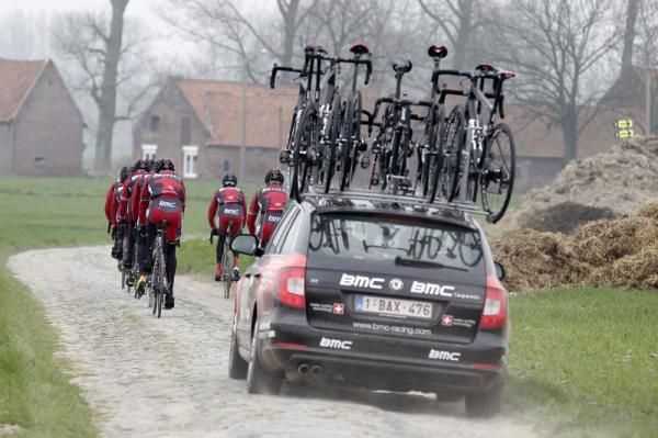 The BMC team car follows the riders on their recon