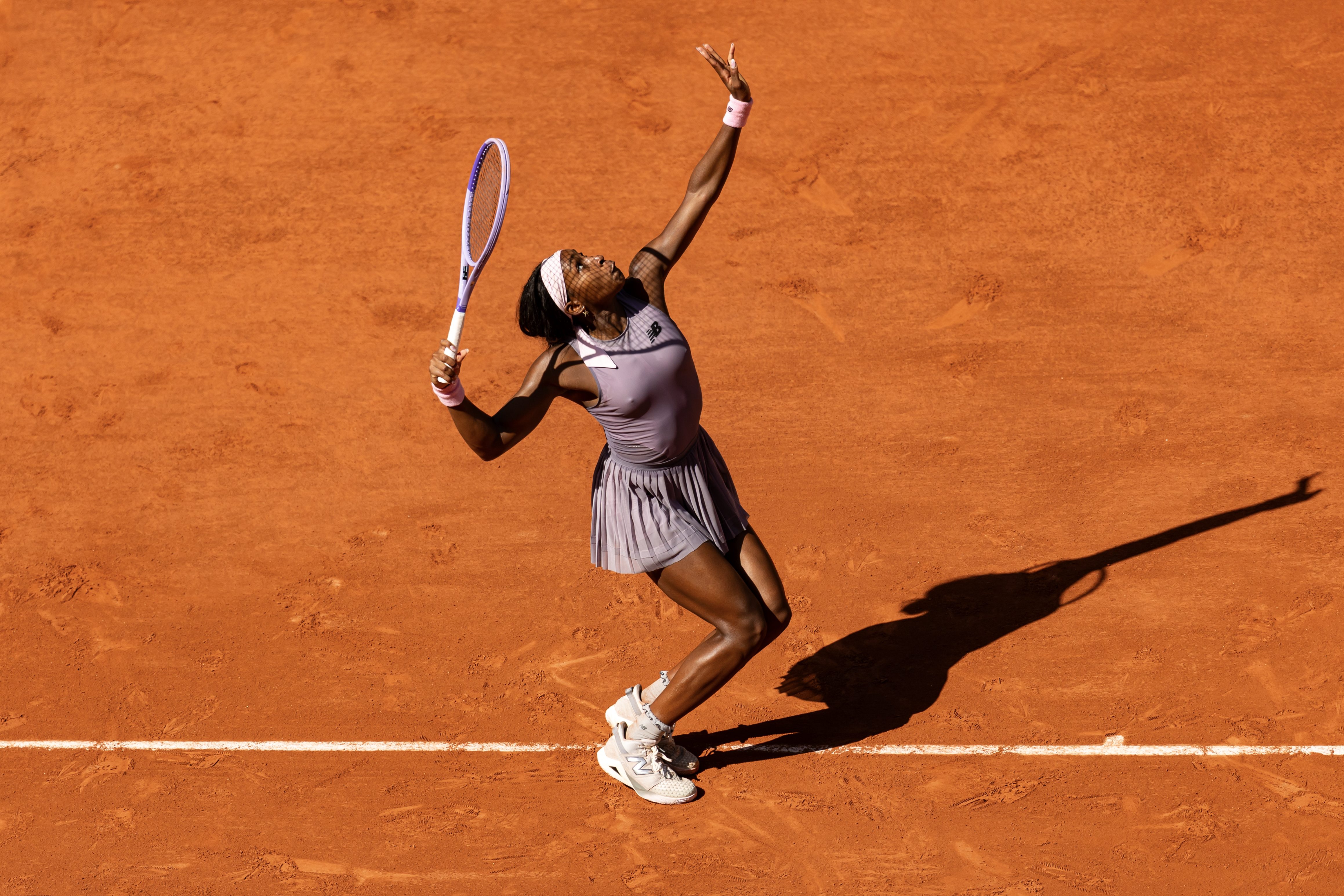 Coco Gauff wore a custom tennis dress from New Balance, alongside chunky sneakers at the 2026 French Open