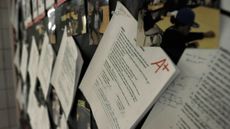 A student&rsquo;s paper is seen with an A+ grade. 