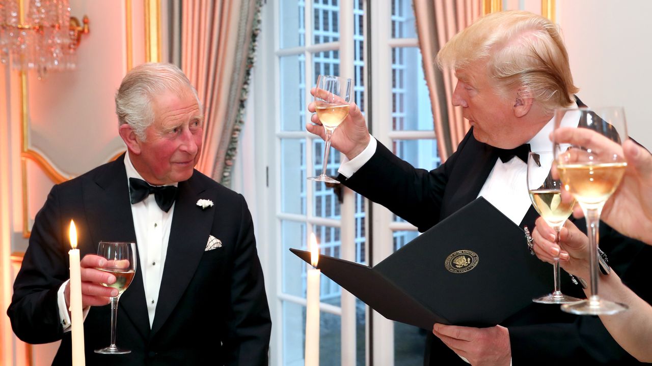 King Charles wearing a tuxedo toasting Donald Trump with wine at a 2019 dinner