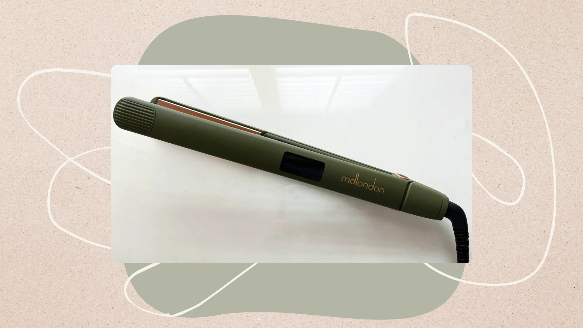 Image of green mdlondon Strait hair straightener on a beige background with sage green circle and cream swirl