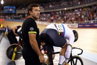 The Australian Cycling Team's sprint coach, Ross Edgar, helps the then world champion, Matthew Glaetzer, prepare for the sprint at the London round of the 2018 UCI Track World Cup