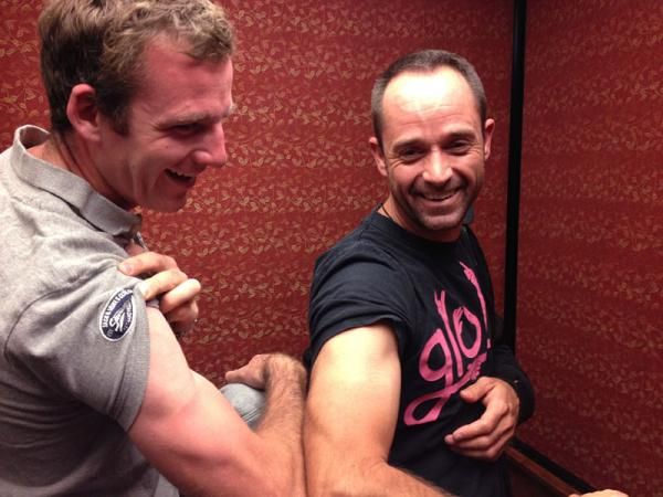 Paddy and Gavin compare muscles and cycling tans