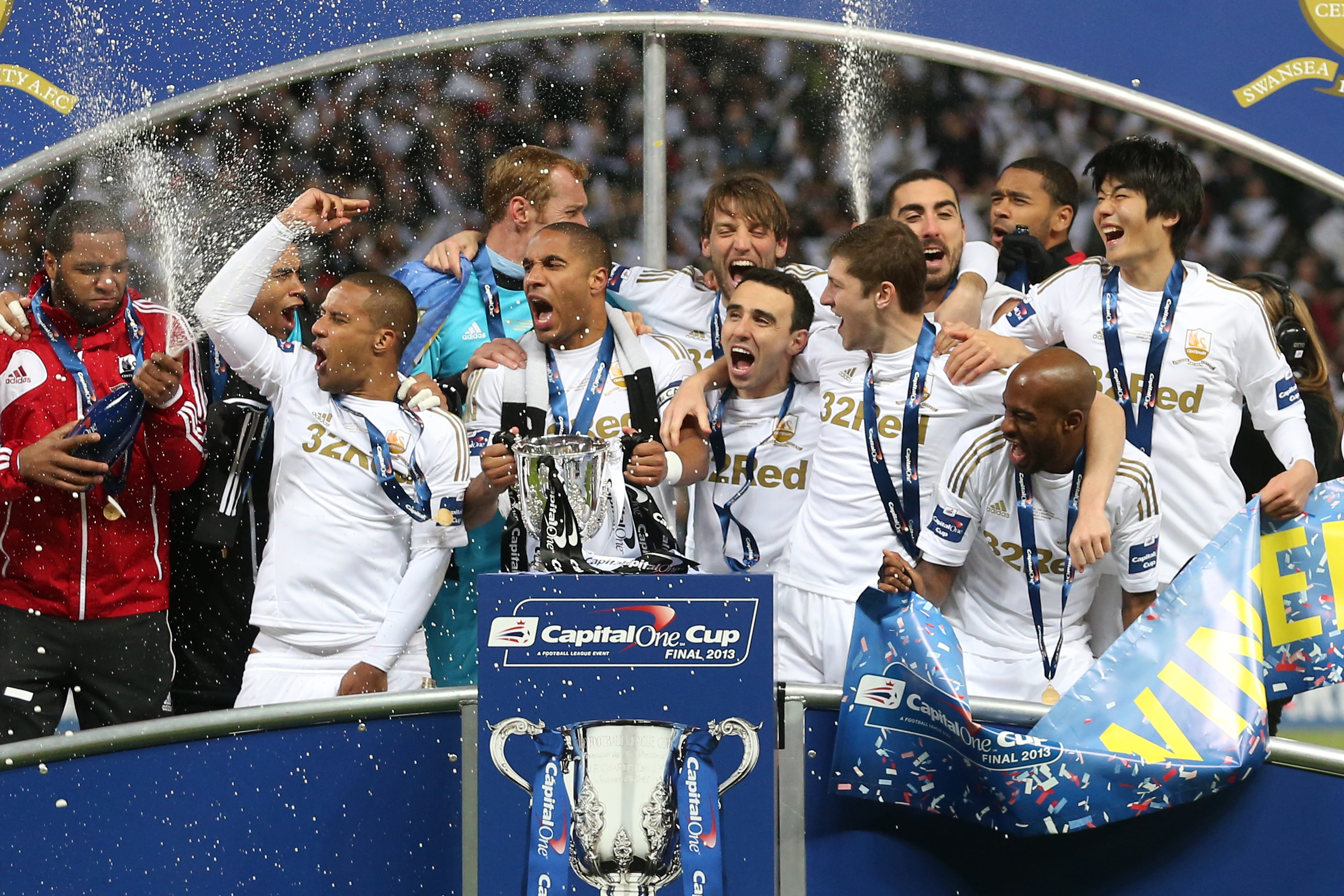 Swansea City celebrate their League Cup final win over Bradford City in February 2013.