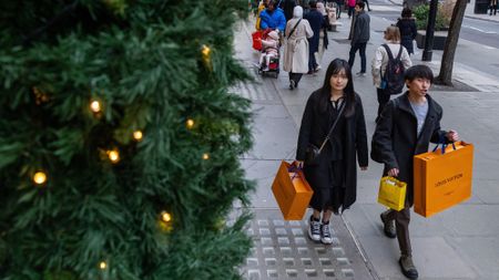 Shoppers are pictured outside department store a week before Christmas Day, 2023, in London, United Kingdom.