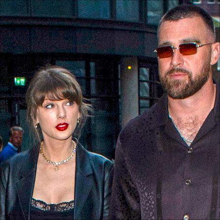 Taylor Swift wears a lacy silk skirt and matching top with a long leather trench coat and Celine sandals for a London date with Travis Kelce