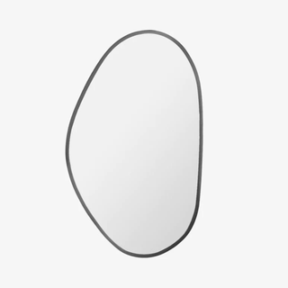 A blob-shaped wall mirror with a black border