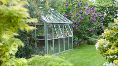 A greenhouse with windows open