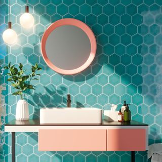 room with blue hexagonal tiled wall and plant in white pot